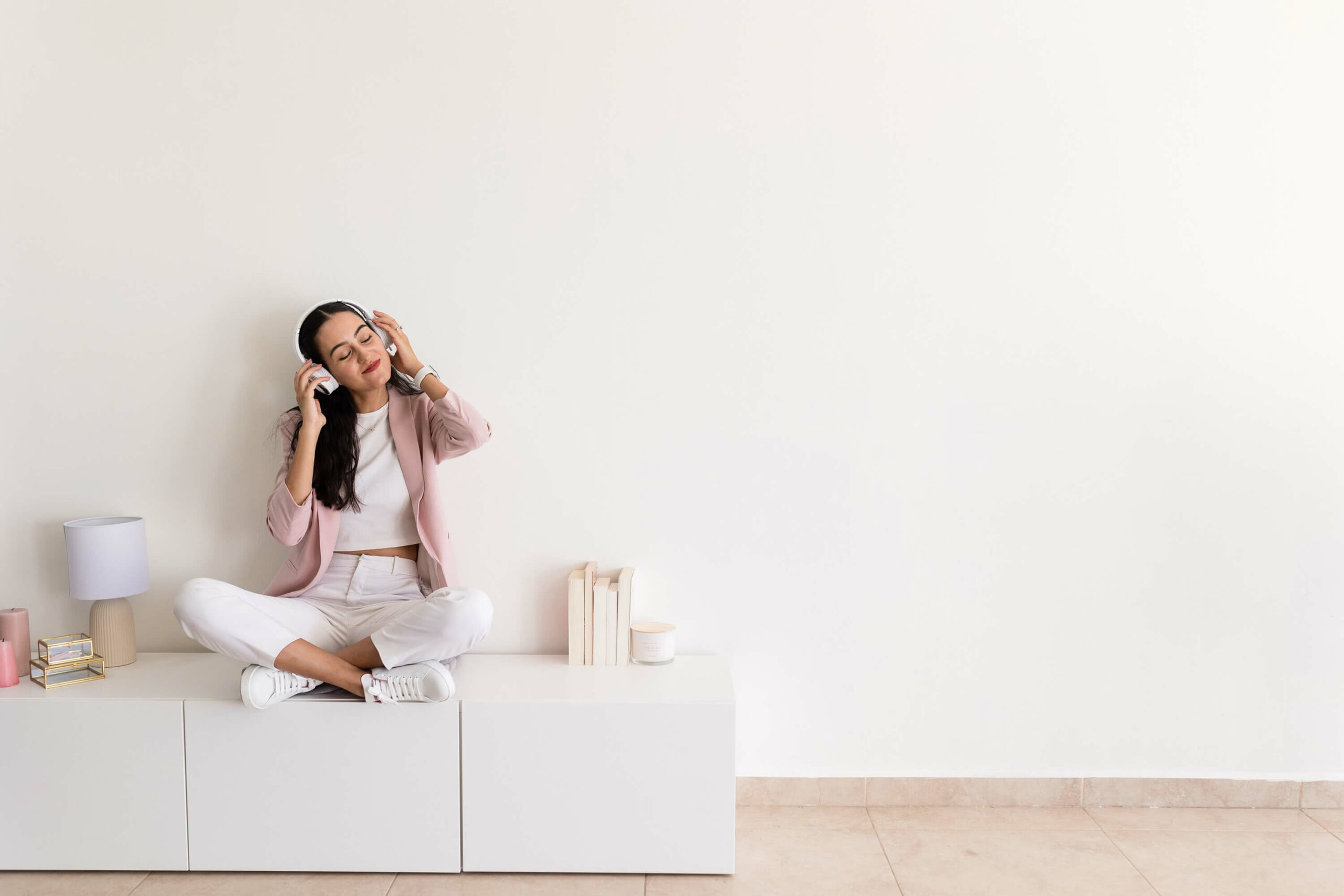 listening-to-private-podcast business owner at home listening to a private podcast