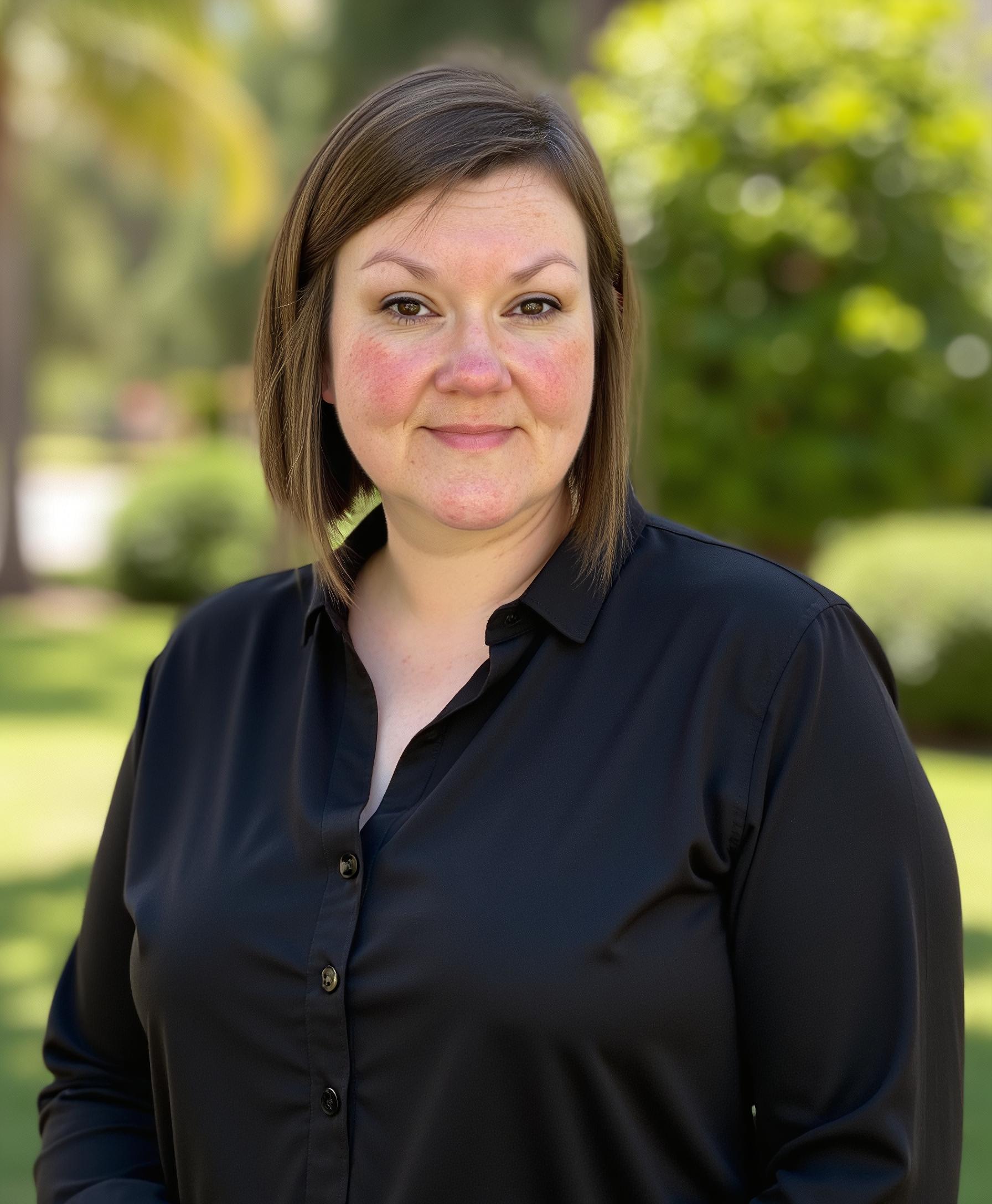 headshot of Leah Bryant Co, host of podcasting problem solver