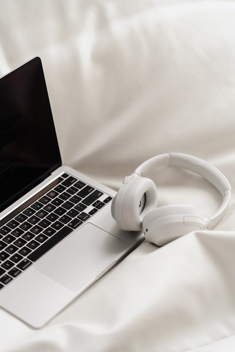 laptop at remote office with headphones