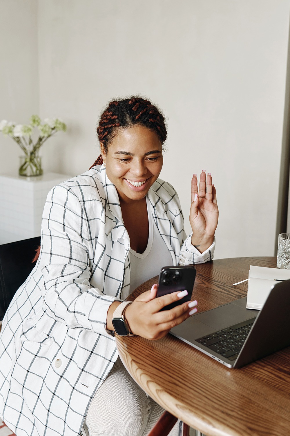 entrepreneur on phone while working on podcast strategy