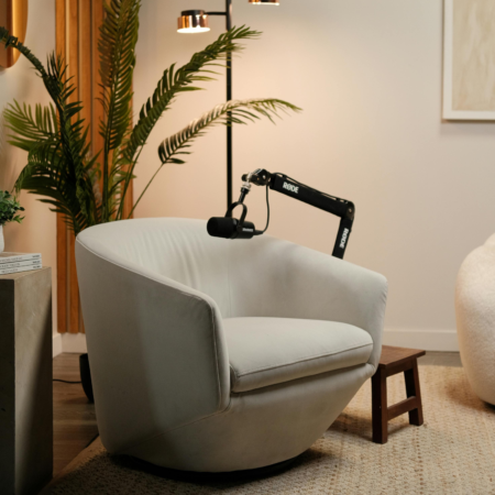 Professional podcast recording setup with microphone and boom arm for podcast growth strategy and business podcasting