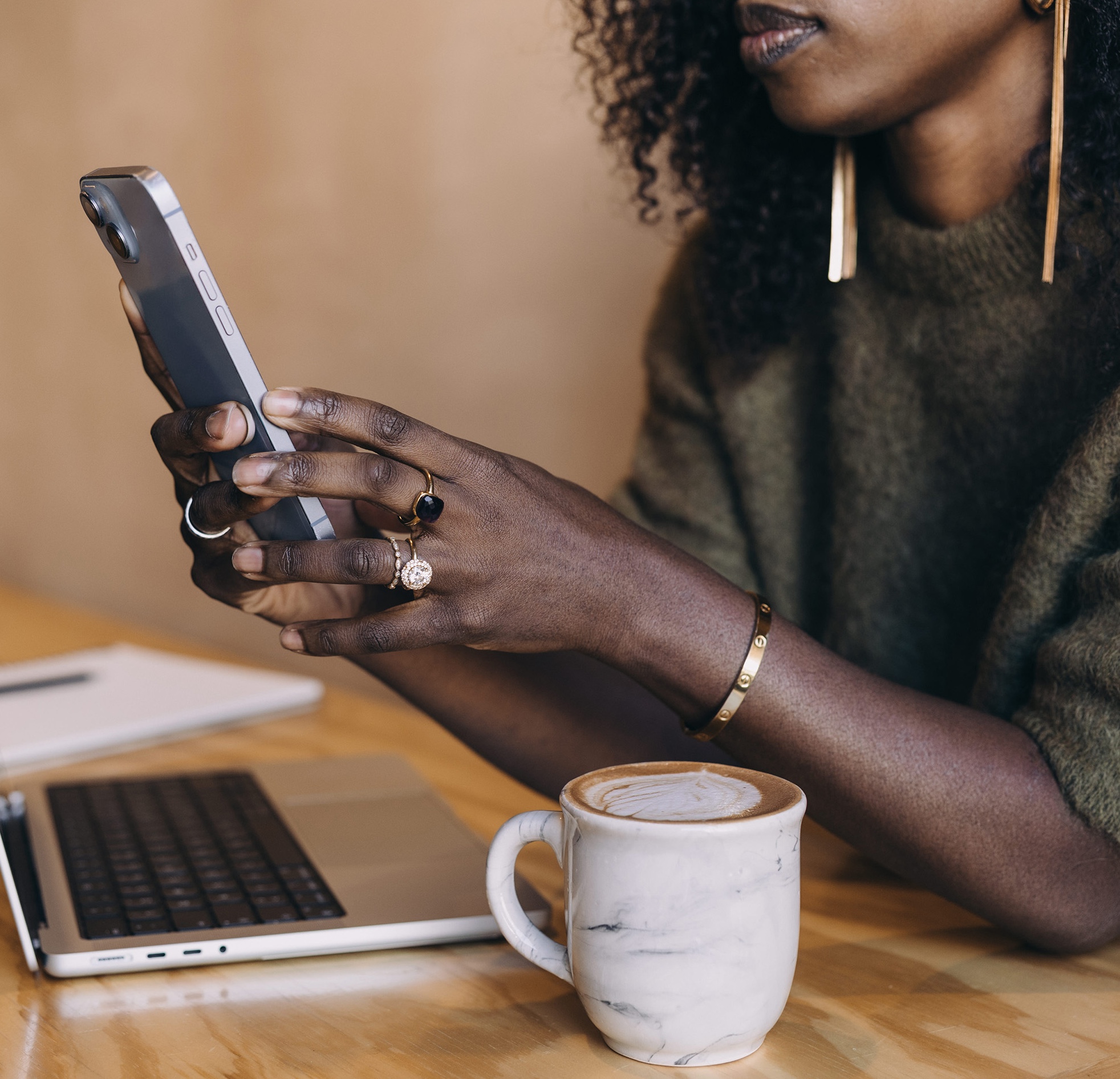 Podcaster checking podcast distribution across multiple platforms to future-proof against algorithm changes