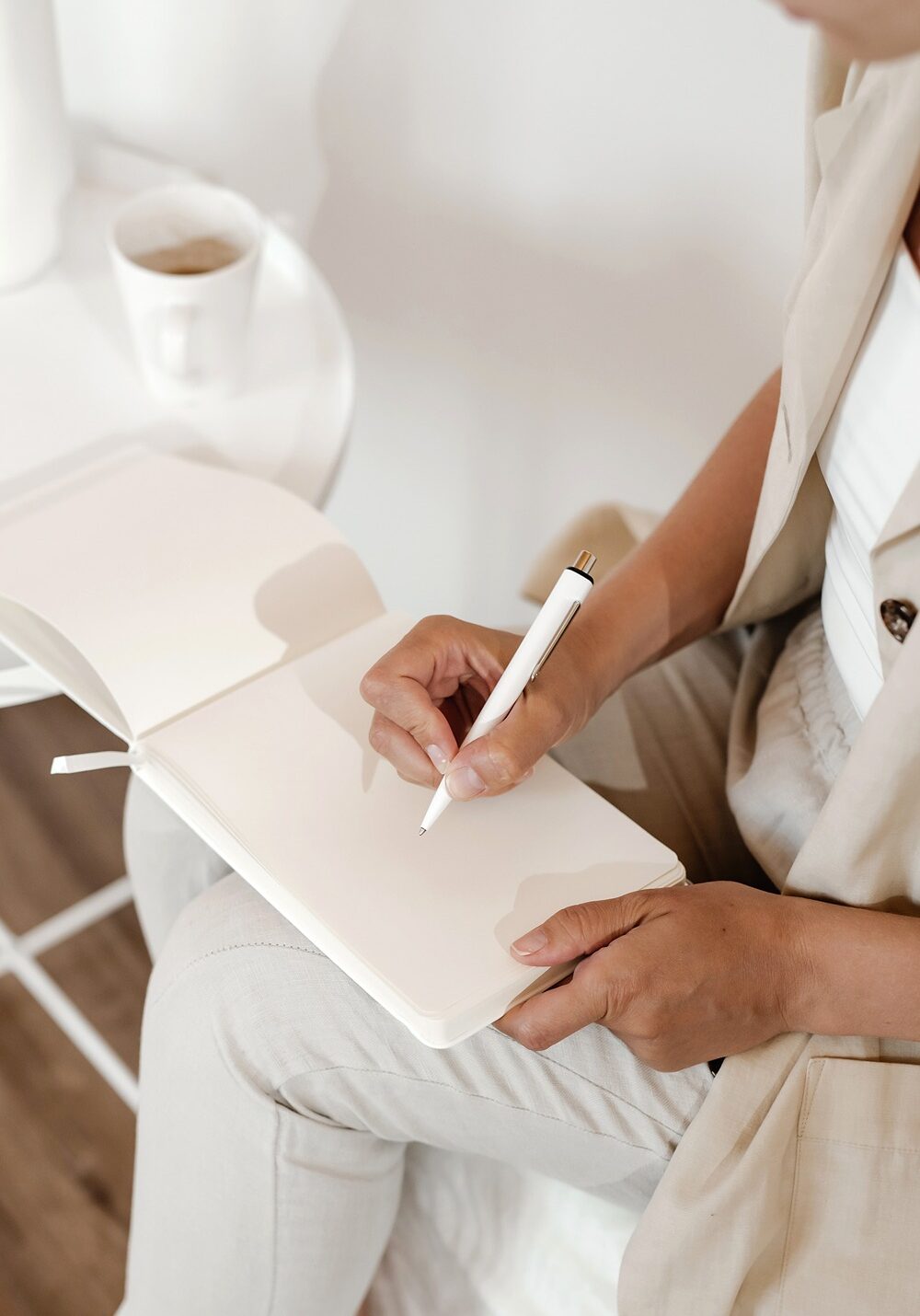 podcast-coaching business owner taking notes during podcast coaching